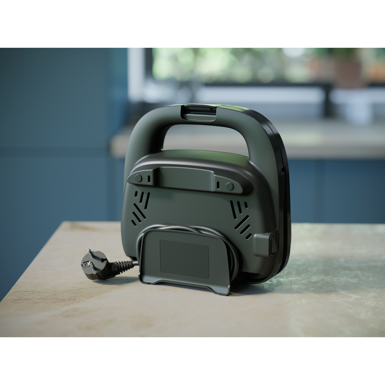 The back of a sandwich maker with a handle and a power cord, in a kitchen setting.
