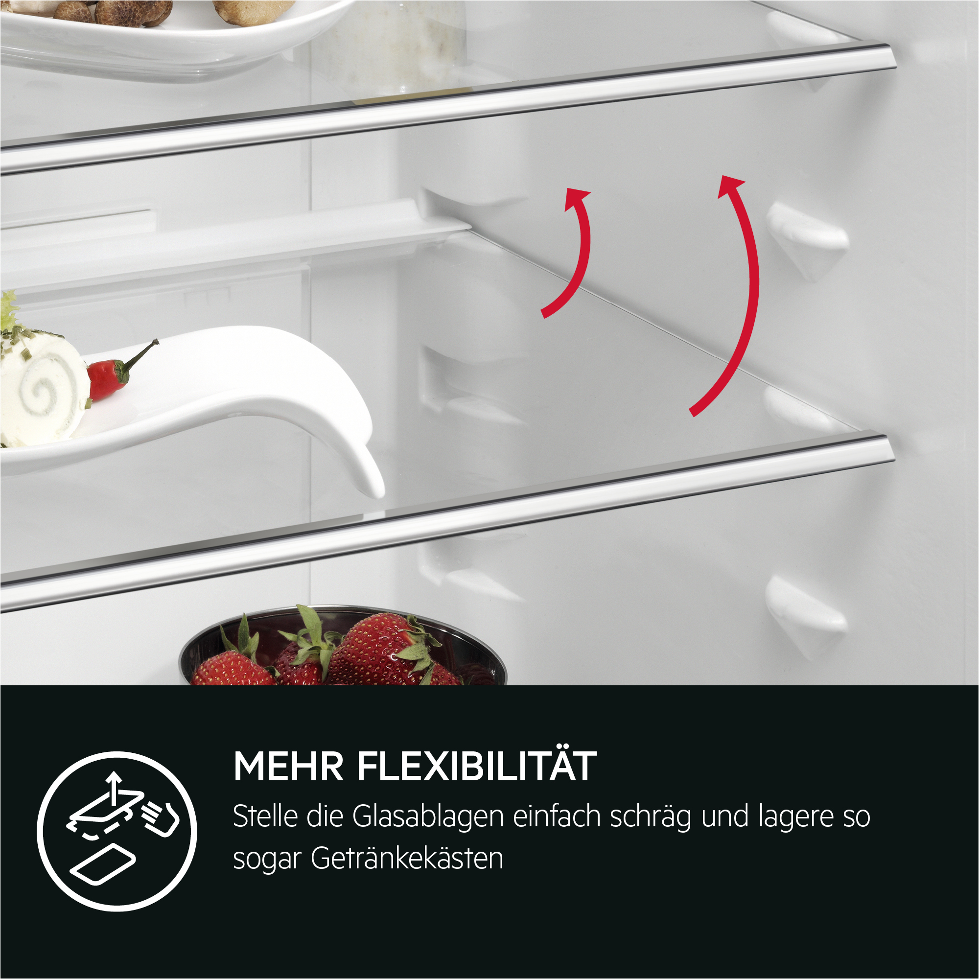 In einem Kühlschrank. Glasböden, Erdbeeren und Pfeile, die verstellbare Böden anzeigen.
