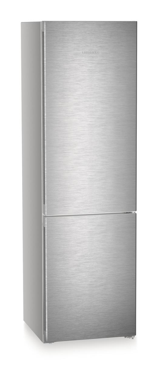 Ein Edelstahlkühlschrank, hoch und schmal, mit oberer und unterer Tür.