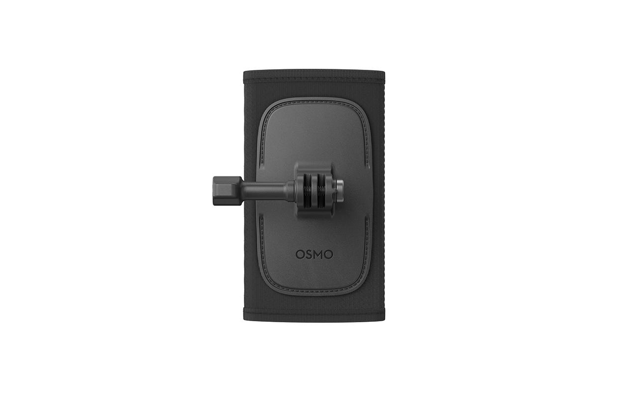 Ein schwarzer Osmo-Armriemen mit einer Kamerahalterung, die an einem schwarzen Riemen befestigt ist.