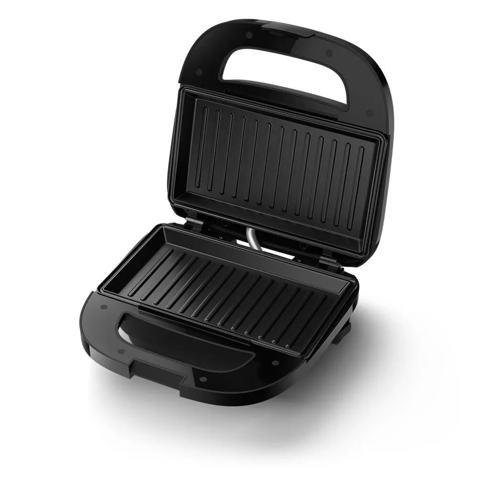 Fekete szendvicssütő, nyitott, tapadásmentes grill lapokkal.