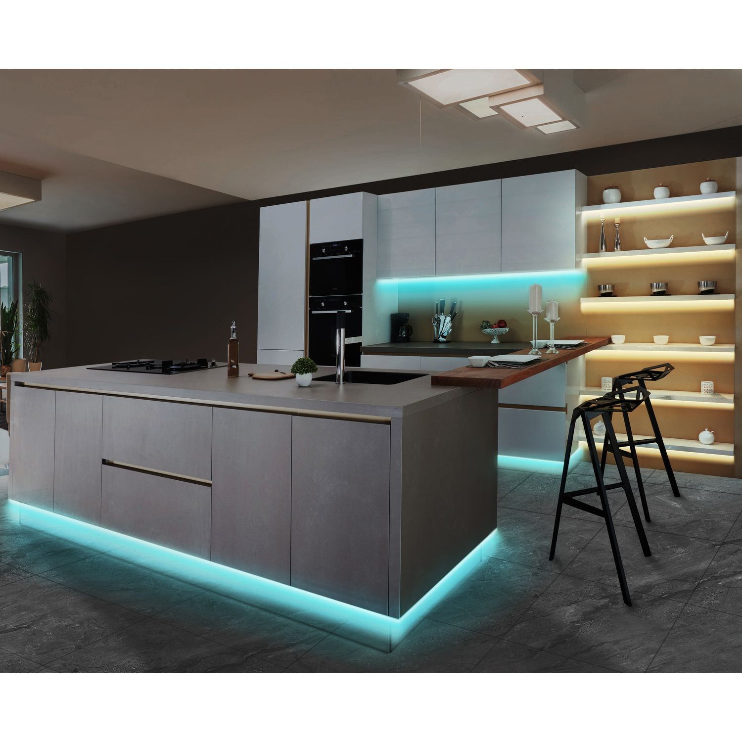 Modern kitchen with island and bar stools. Blue LED lights under the island.