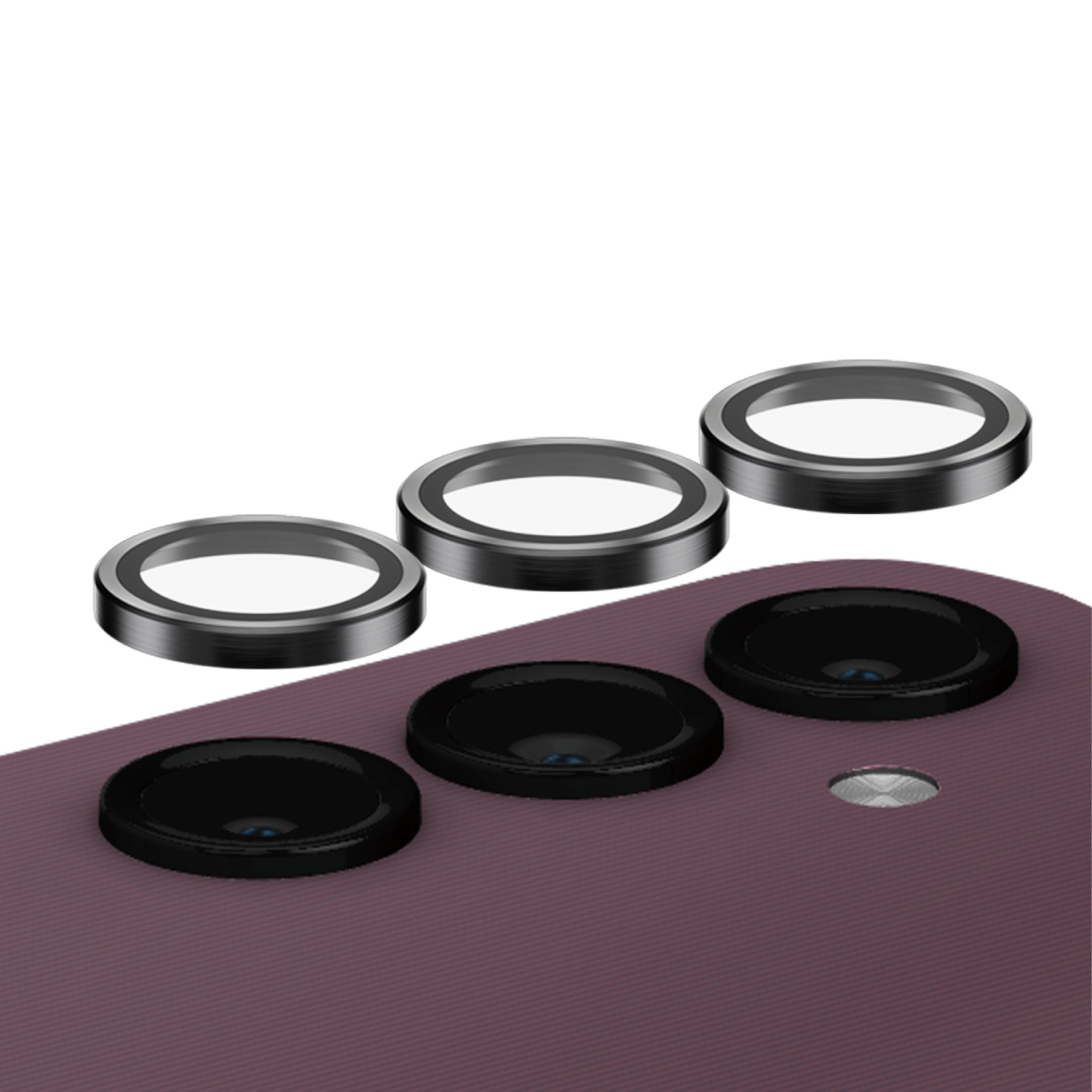 Drie cameralenzen op een telefoon. De lenzen zijn zwart met zilveren ringen en een paarse telefoonachterkant.