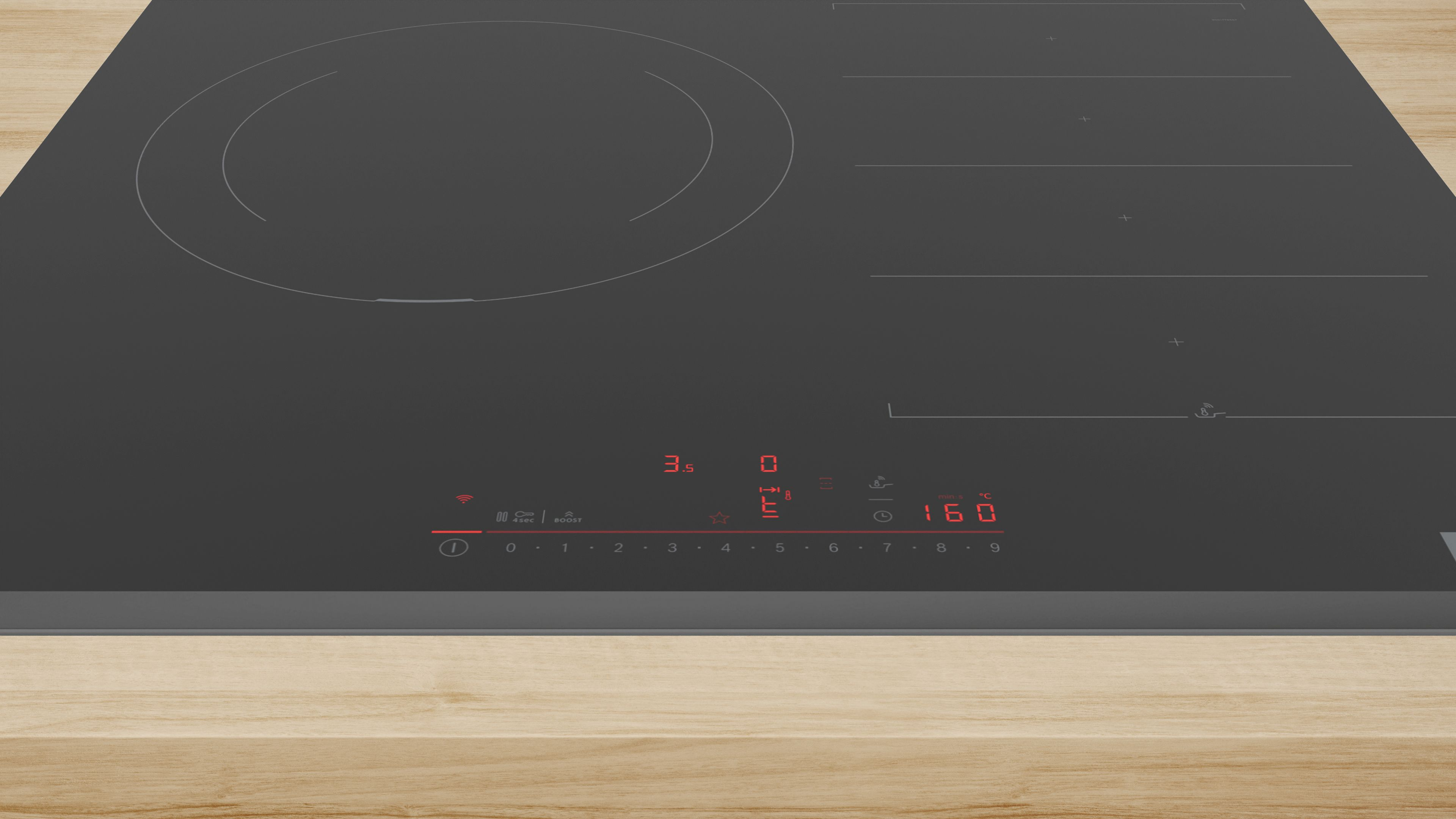 Una mesa de madera con fondo negro. La mesa está en primer plano.