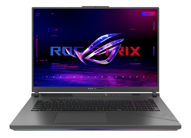 Laptop, białe tło, logo ROG STRIX na ekranie, klawiatura RGB.