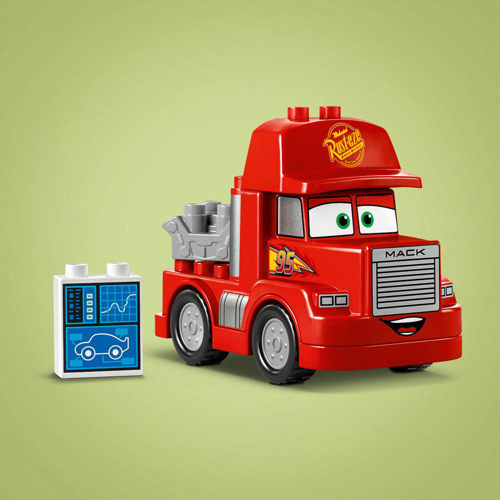 Roter Mack-Truck Lego-Spielzeug mit einem passenden blauen Diagnosetool-Spielzeug.