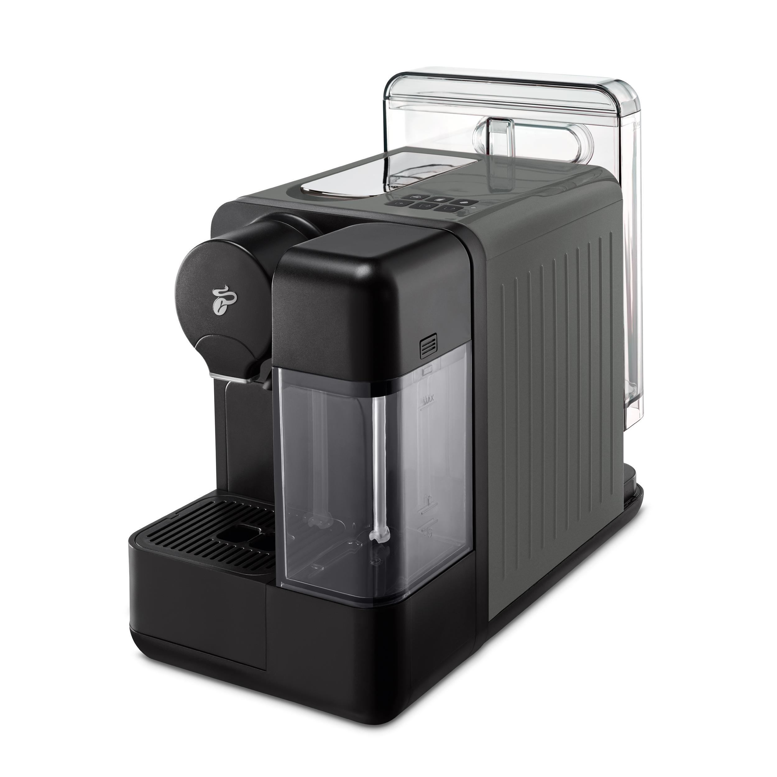 Schwarz-graue Kaffeemaschine auf weißer Oberfläche. Transparenter Wassertank.