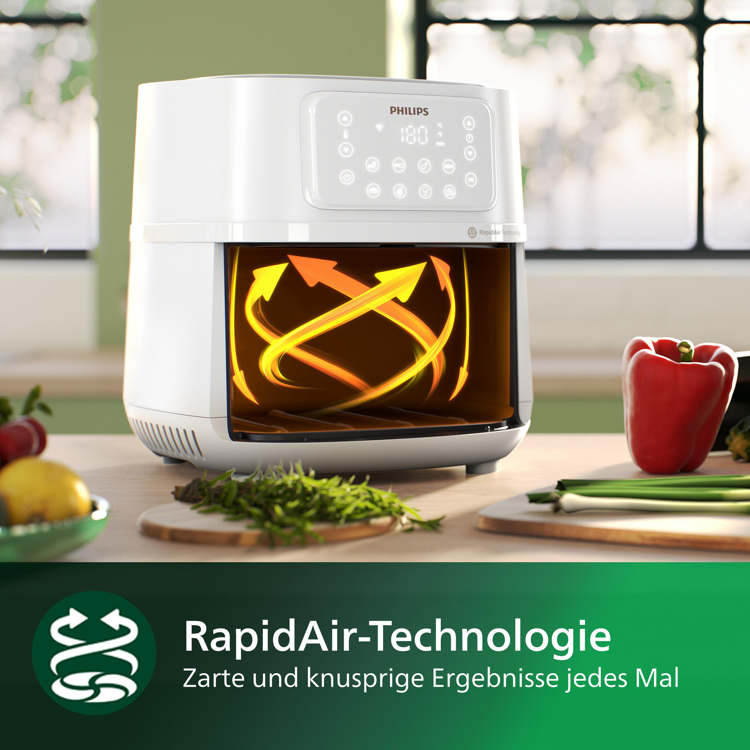 Weißer Philips-Heißluftfritteuse mit orangefarbenen Pfeilen, Gemüse auf Holzbrett, grüner Hintergrund.