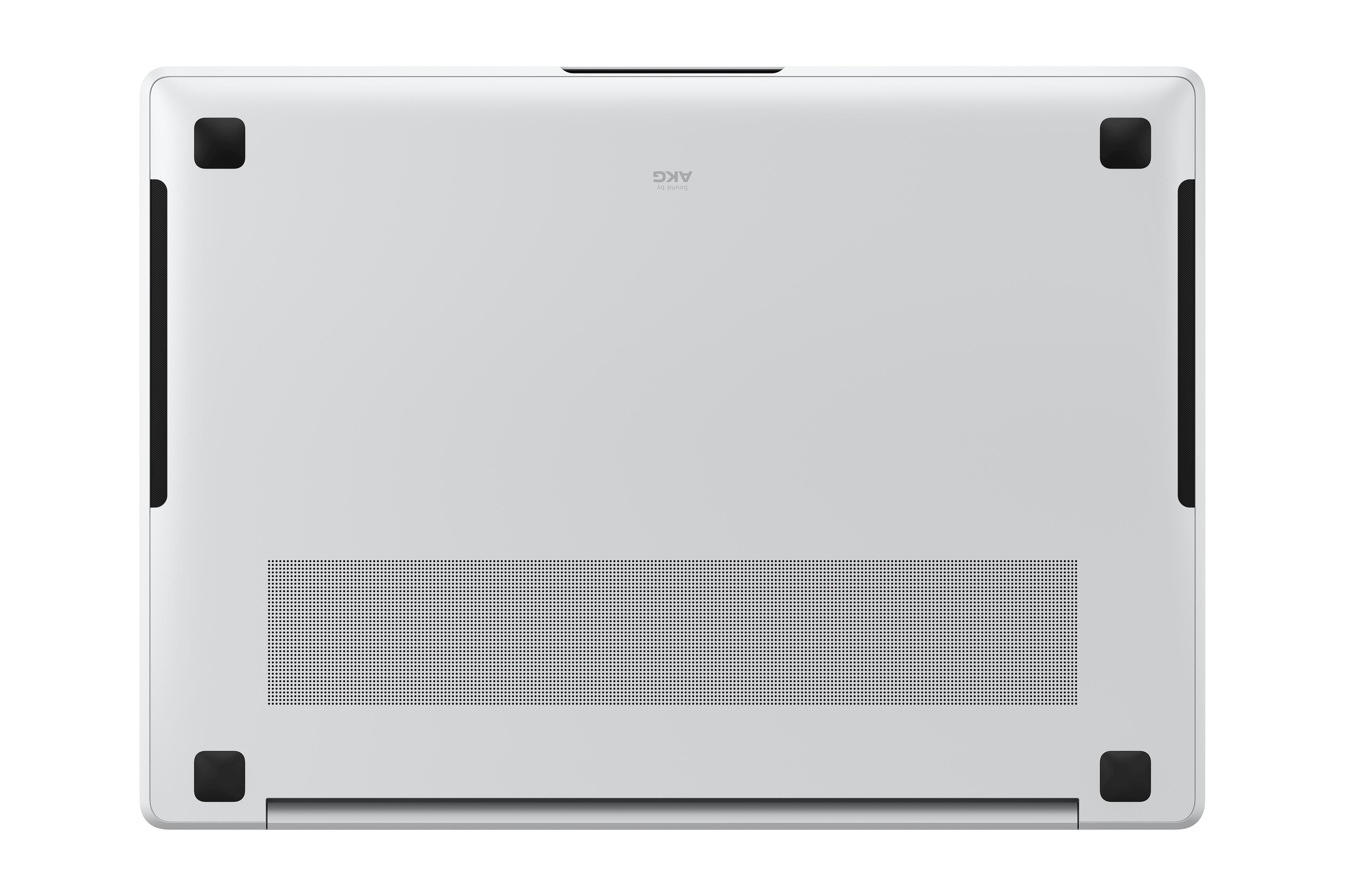 Die Unterseite eines weißen Laptops mit Lautsprechern und schwarzen Füßen.