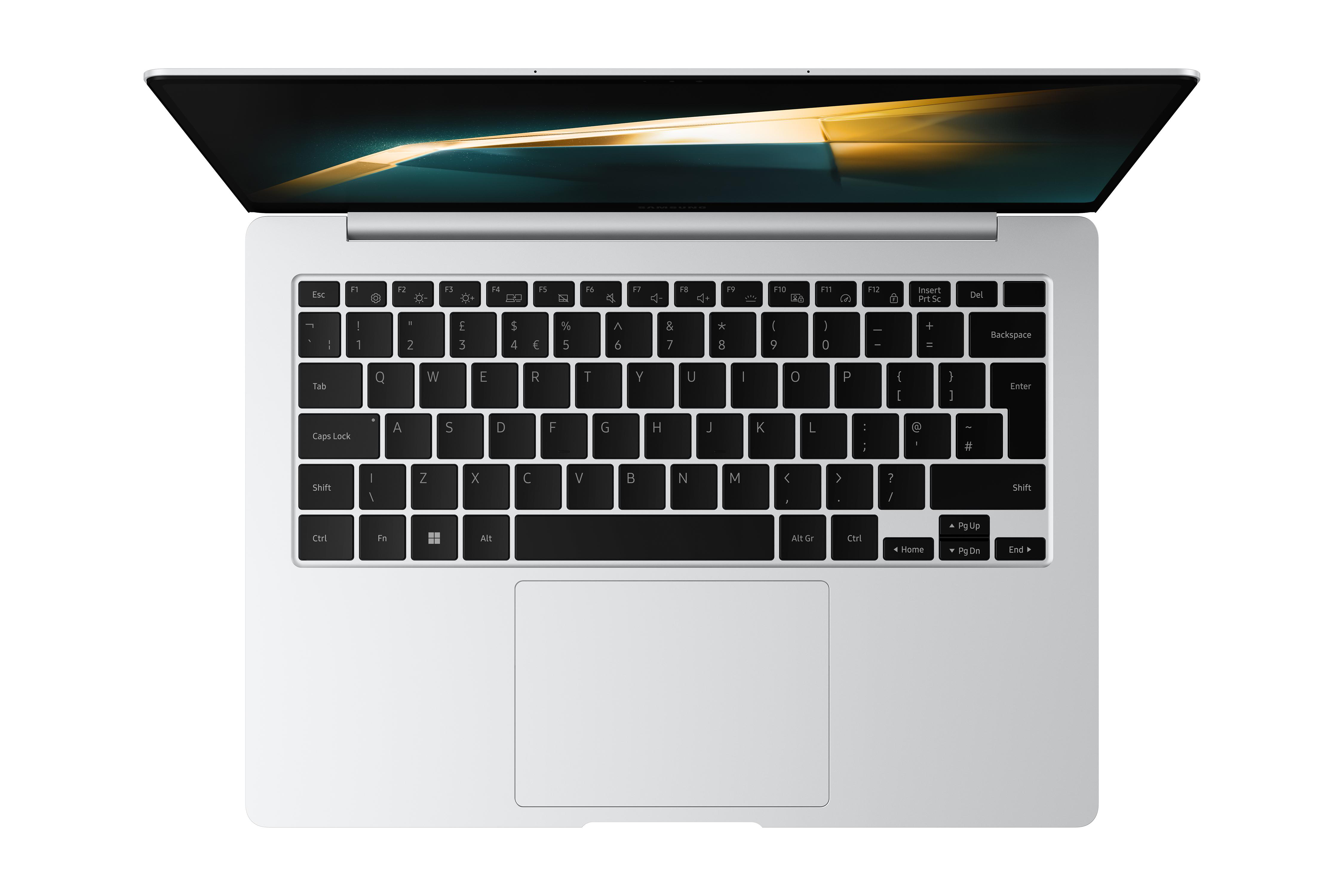 Ein silberner Laptop offen, Draufsicht. Die Tastatur ist schwarz, mit einem Trackpad unten.