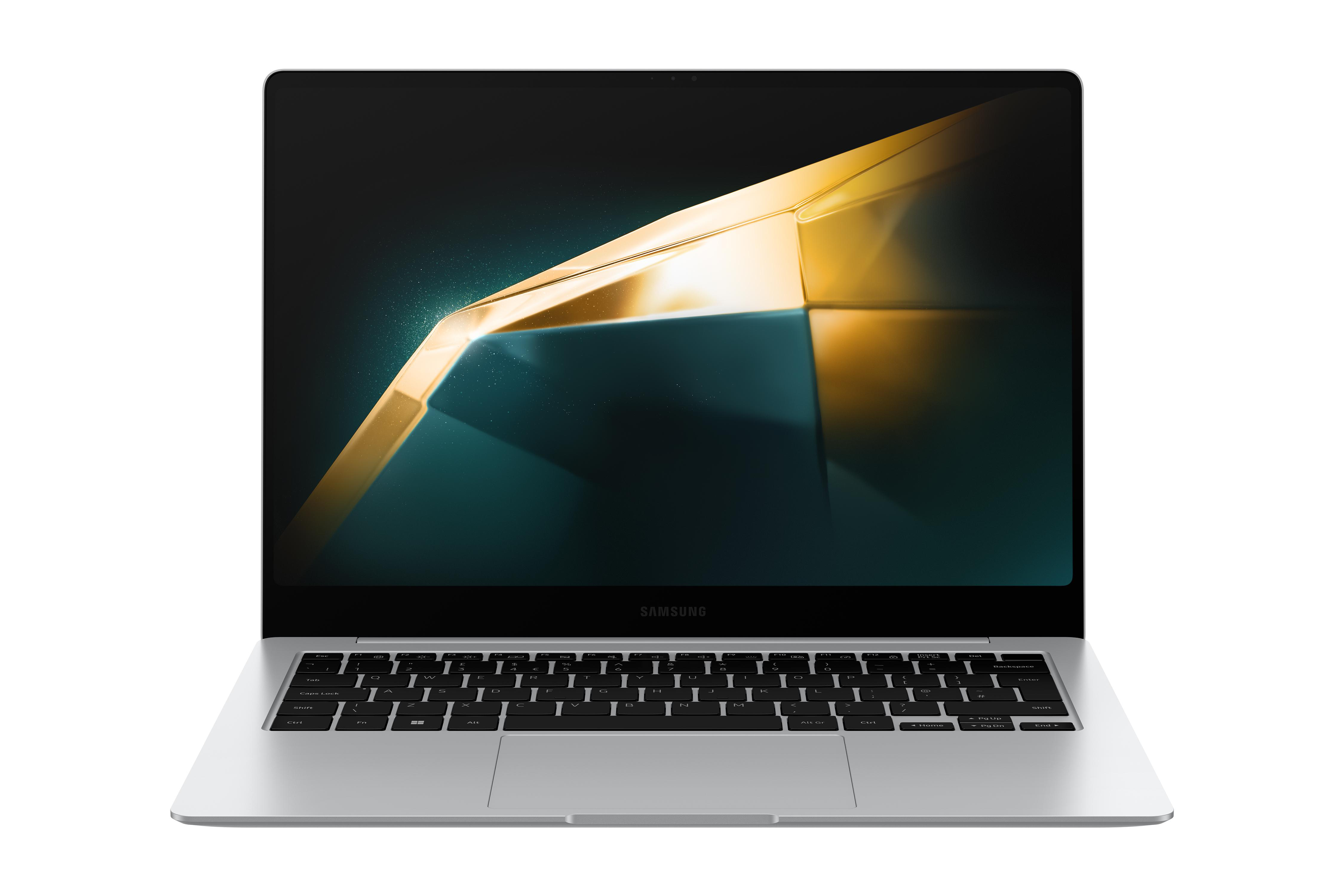 Silberner Laptop mit schwarzer Tastatur. Ein goldenes und schwarzes geometrisches Design auf dem Bildschirm.