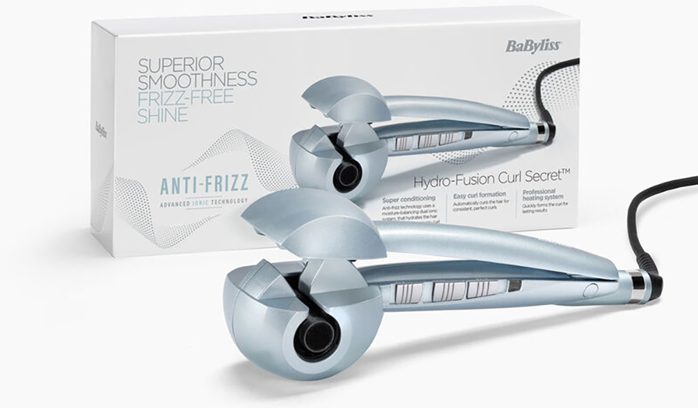 Ezüst hajcsavarók doboza a következő szöveggel: Superior Smoothness, Frizz-Free Shine, Hydro-Fusion Curl Secret.