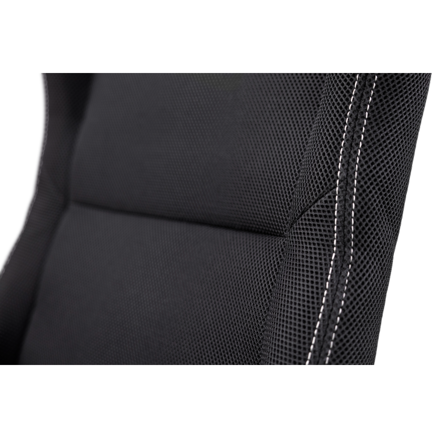 Close-up of a black mesh chair's seat with white stitching detail.