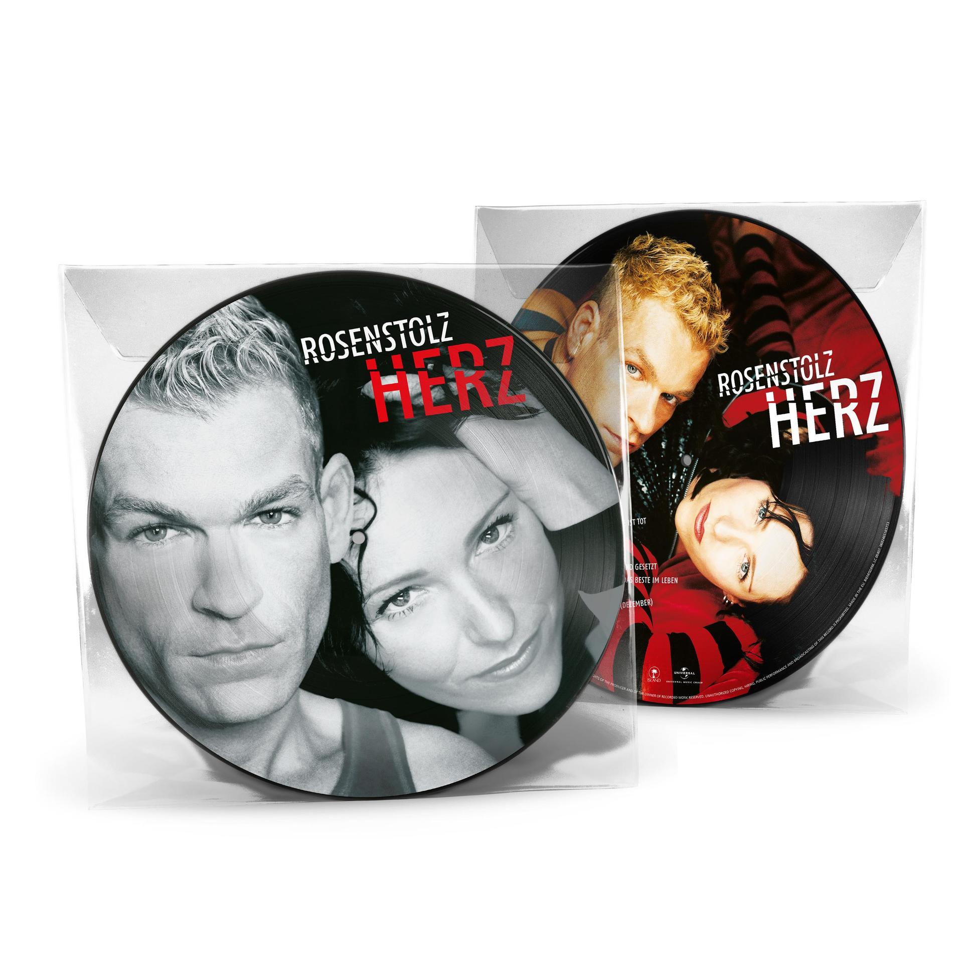 Zwei Vinylplatten in Klarsichthüllen. Die linke Platte zeigt zwei Gesichter. Die rechte Platte hat drei Gesichter und Text.