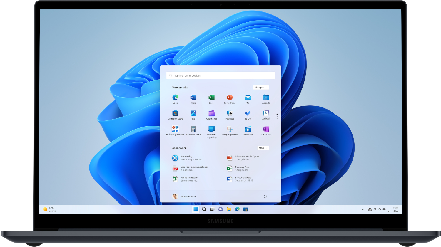 Un ordinateur portable affiche le menu Démarrer de Windows 11. Diverses icônes d'applications sont visibles.