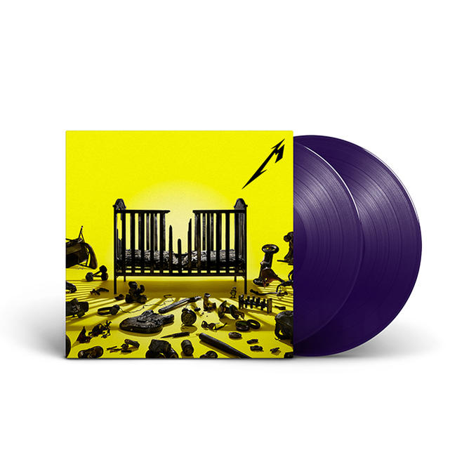 Album borító bölcsővel és szétszórt tárgyakkal, két lila bakelit lemezzel.
