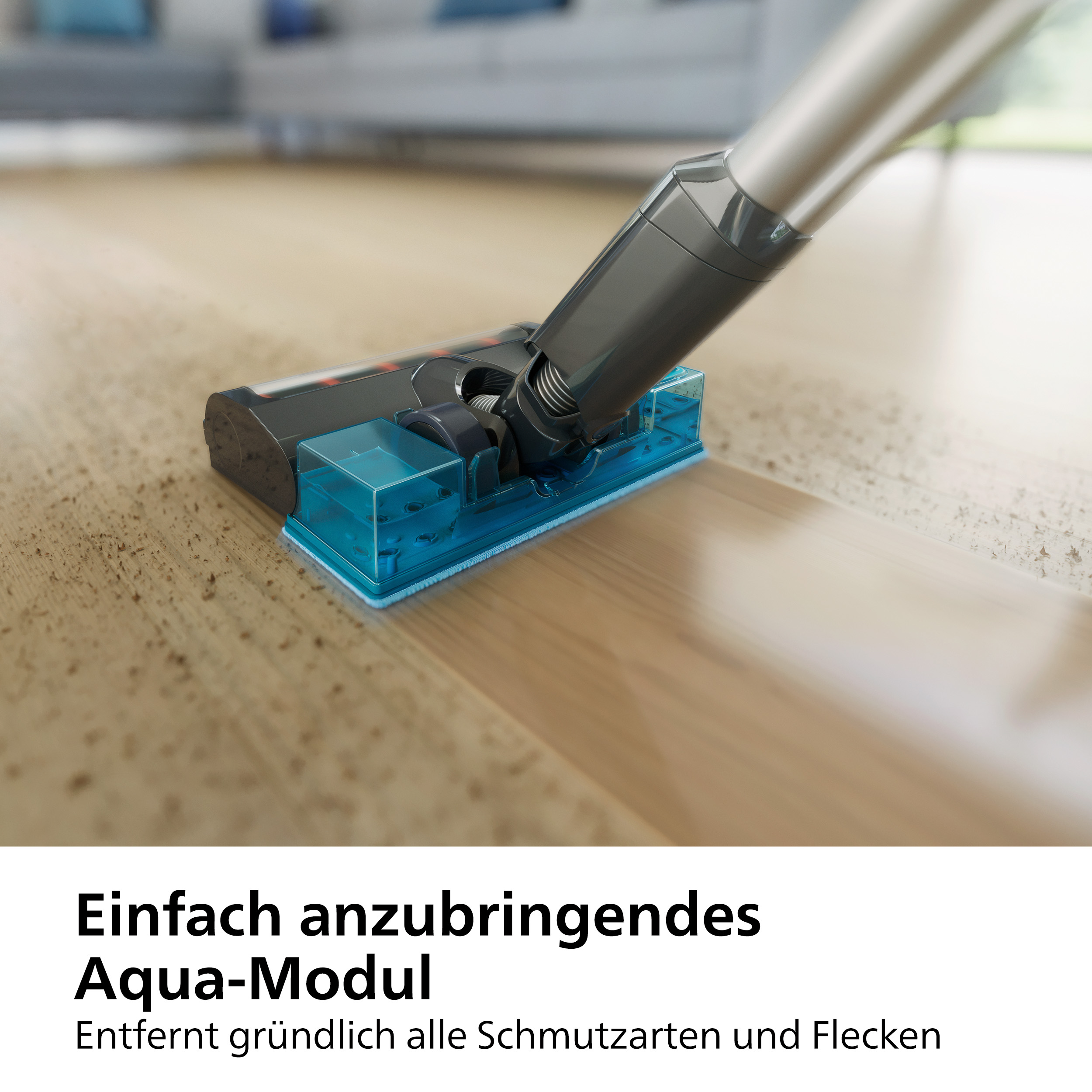 Staubsaugerkopf auf Holzboden, blauer Aufsatz. Text unten.