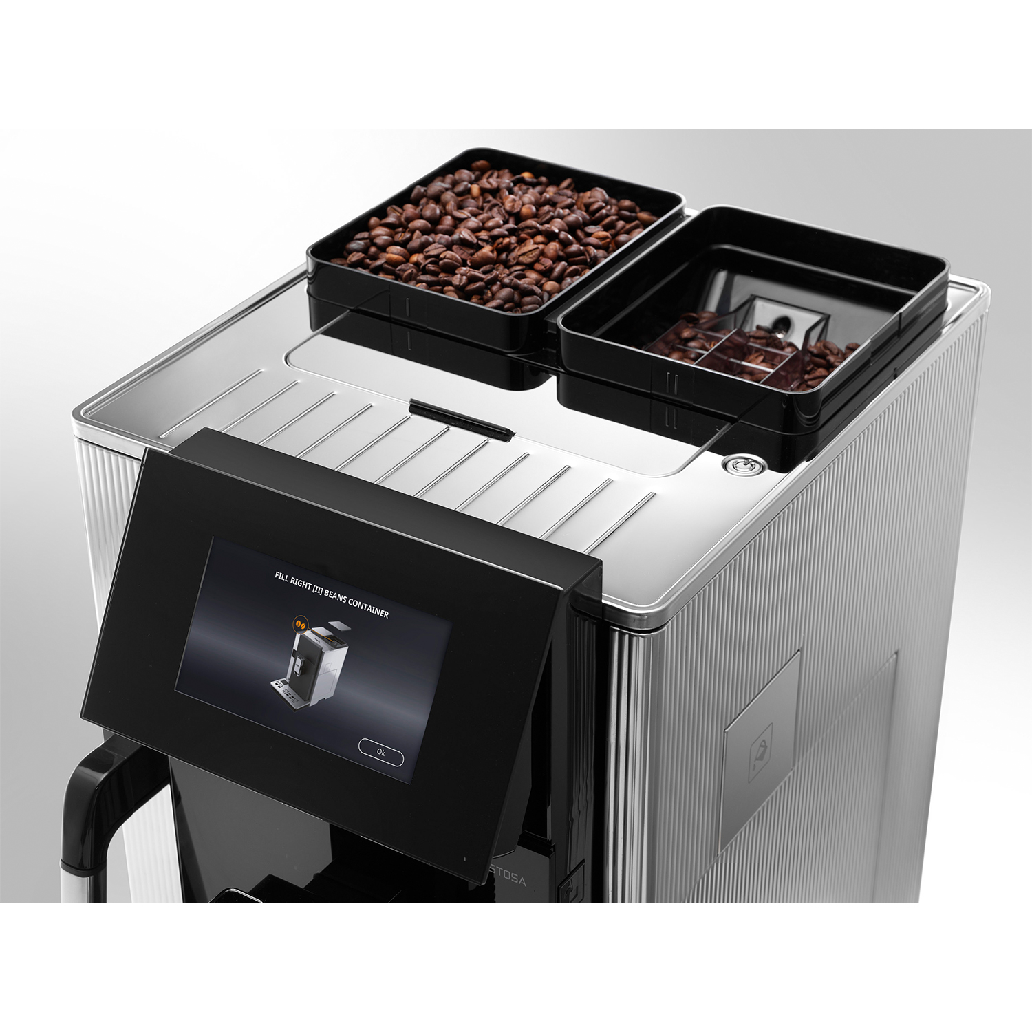Macchina da caffè, vista dall'alto. Due contenitori per chicchi. Schermo: 'Fill right bean container'.