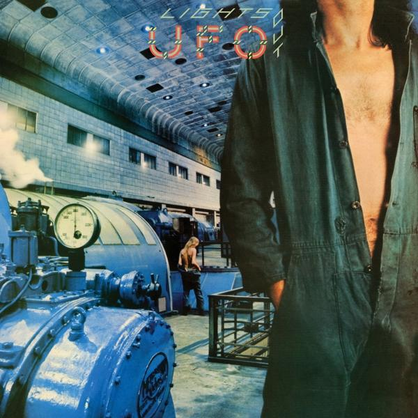 UFO album borító egy munkásruhás férfivel egy nagy kék épületben.
