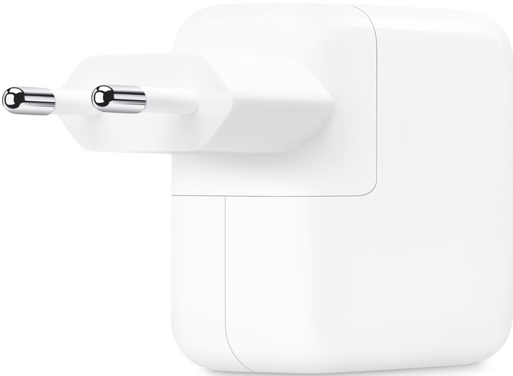 Chargeur Apple blanc avec deux broches argentées.