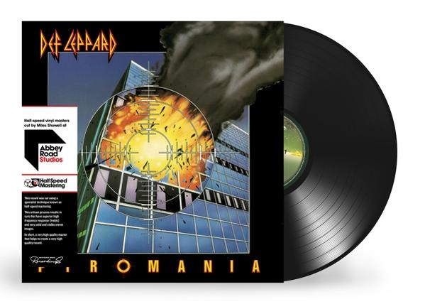 Def Leppard Albumcover. Ein Fadenkreuz auf einem Gebäude, mit einer Schallplatte.