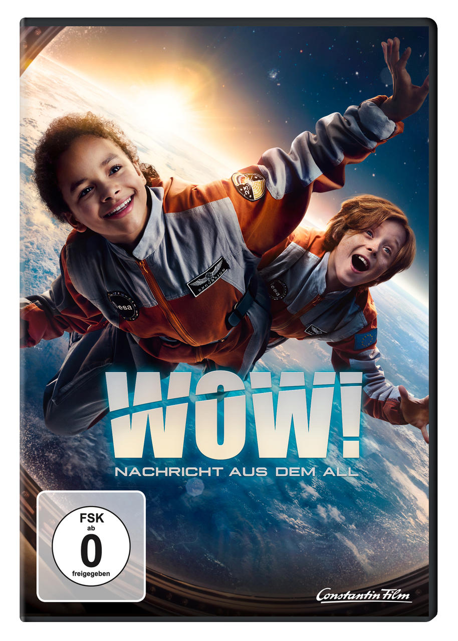 Film-DVD-Cover. Zwei Kinder in Raumanzügen schweben und sehen aufgeregt aus. Titel: WOW! in großen Buchstaben.