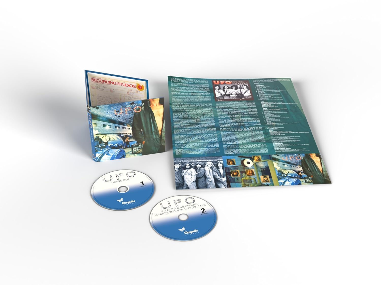 UFO Lights Out album, CD-k és füzet. Kék és fehér CD-k. Fehér háttér.