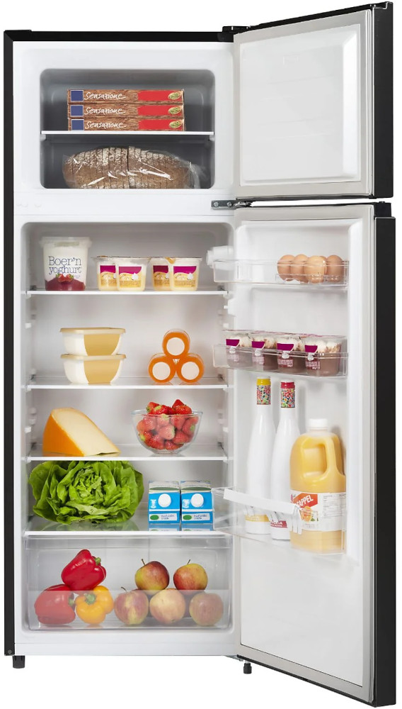Open black refrigerator filled with food: eggs, cheese, strawberries, lettuce, juice, bread, and packaged items.
