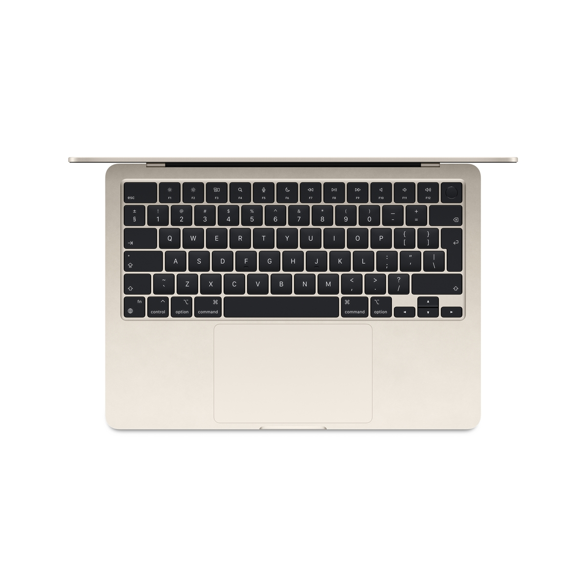 Widok z góry na złotego laptopa z czarną klawiaturą na białym tle.