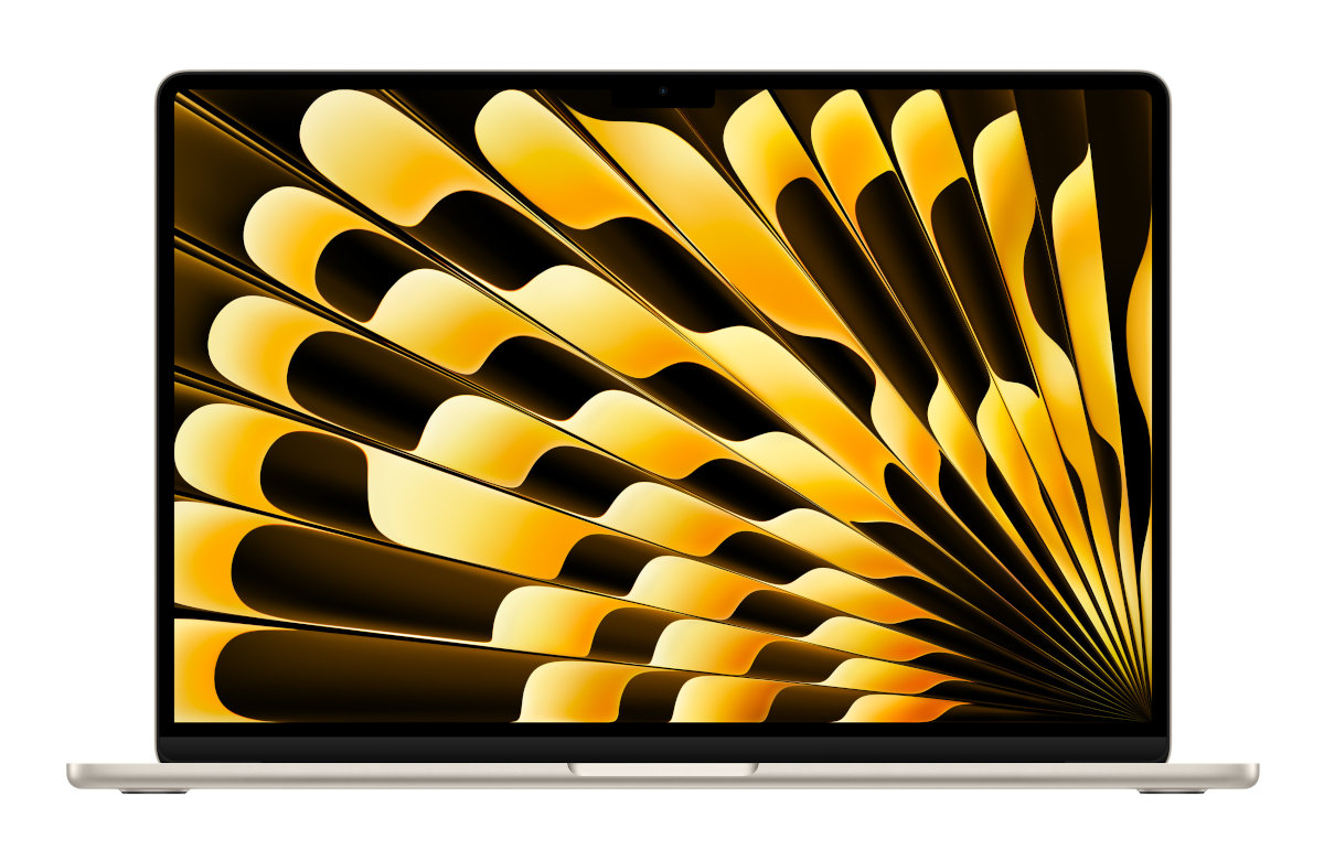 Laptop z złotą grafiką wachlarza na ekranie.