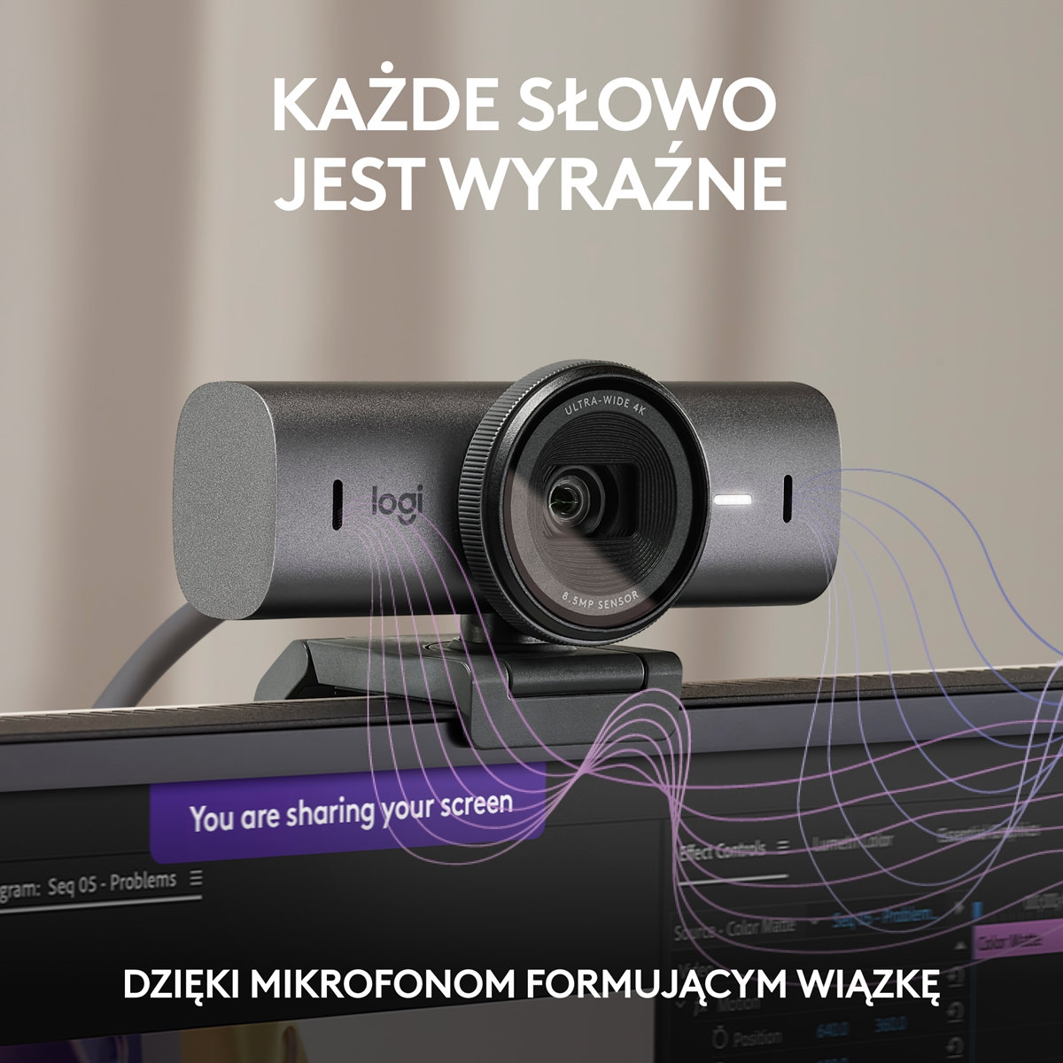 Kamera internetowa na monitorze z tekstem: Każde słowo jest wyraźne. Kamera ma mikrofon.