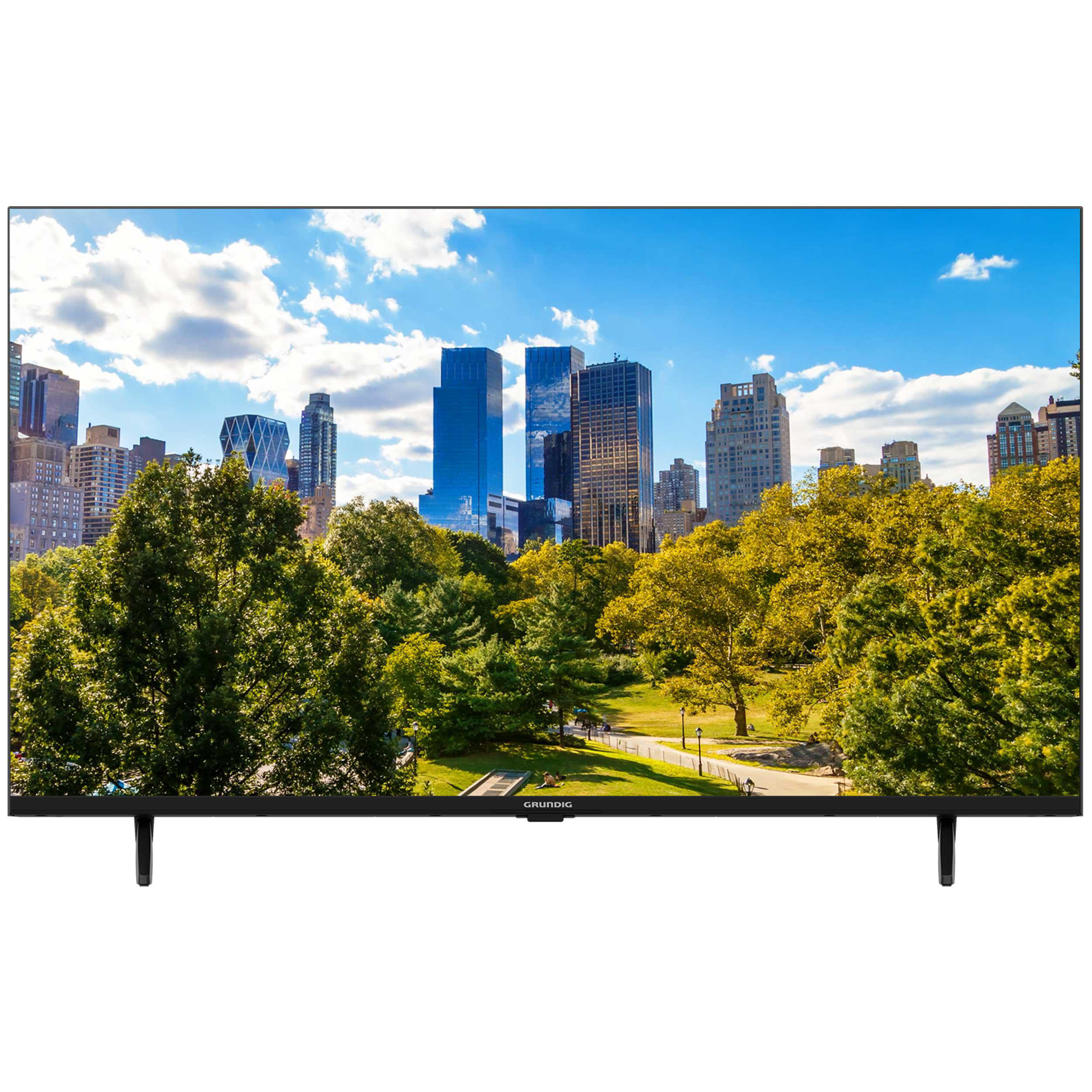 Ein großer Fernseher zeigt eine Stadtlandschaft mit Bäumen und blauem Himmel.