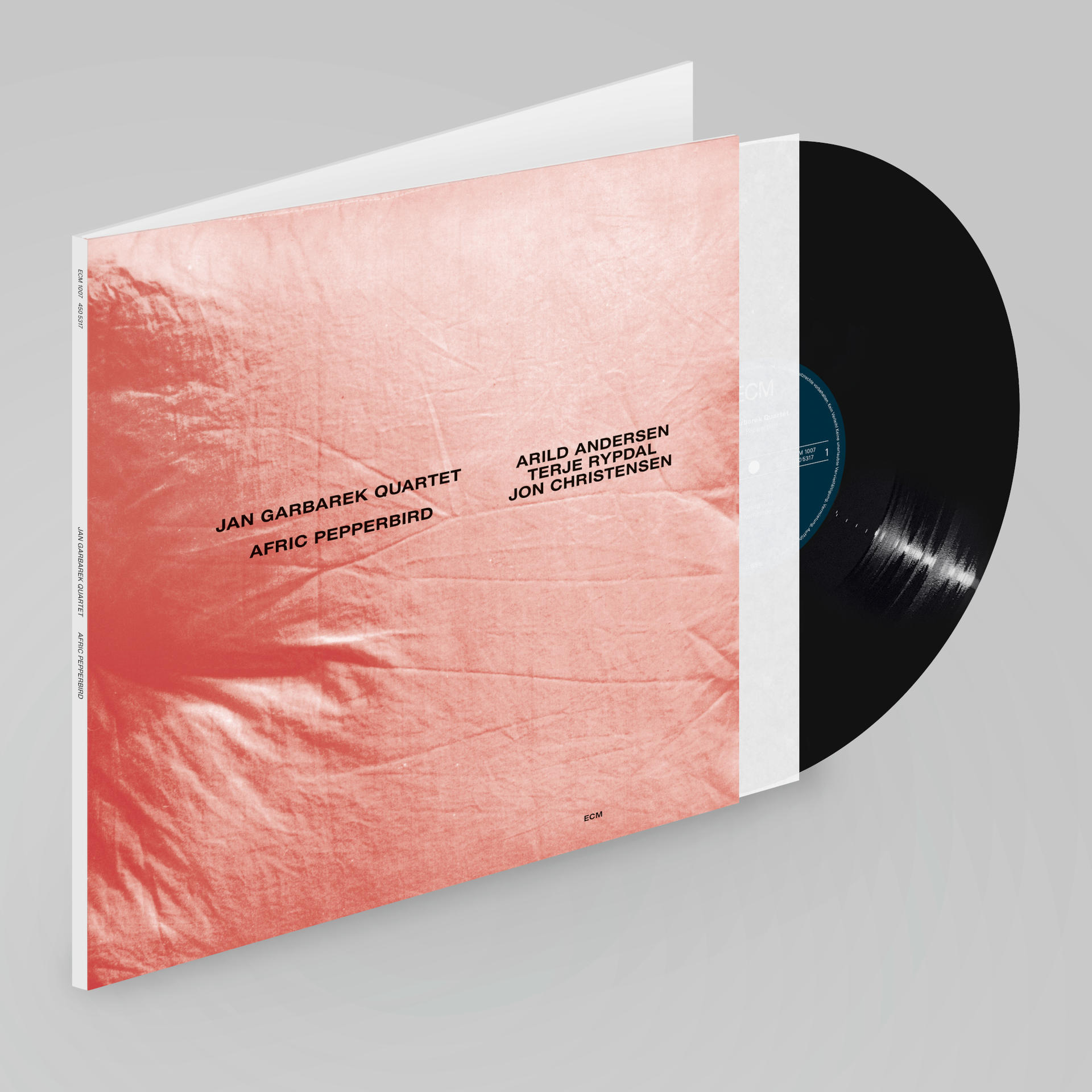 A Jan Garbarek Quartet 'Afric Pepperbird' című albumának borítója, piros és fehér színvilággal.