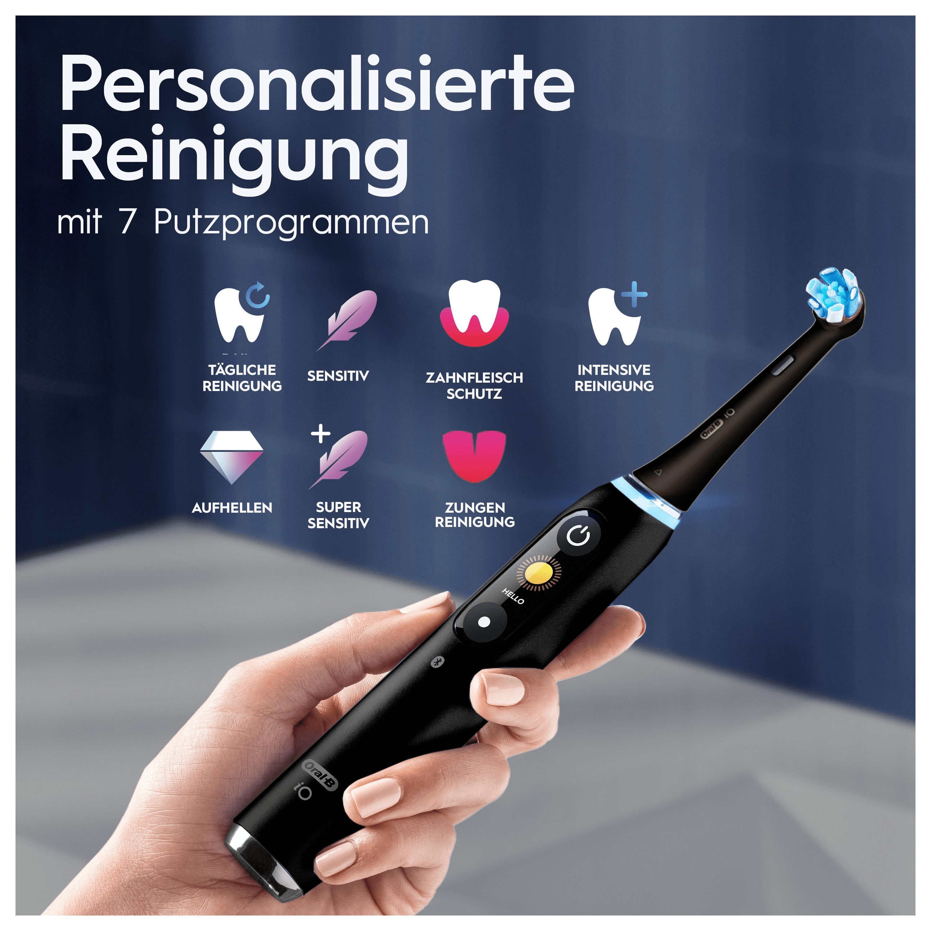 Spazzolino elettrico nero tenuto in mano. Mostra i programmi di pulizia e il logo Oral-B. Sfondo nero.