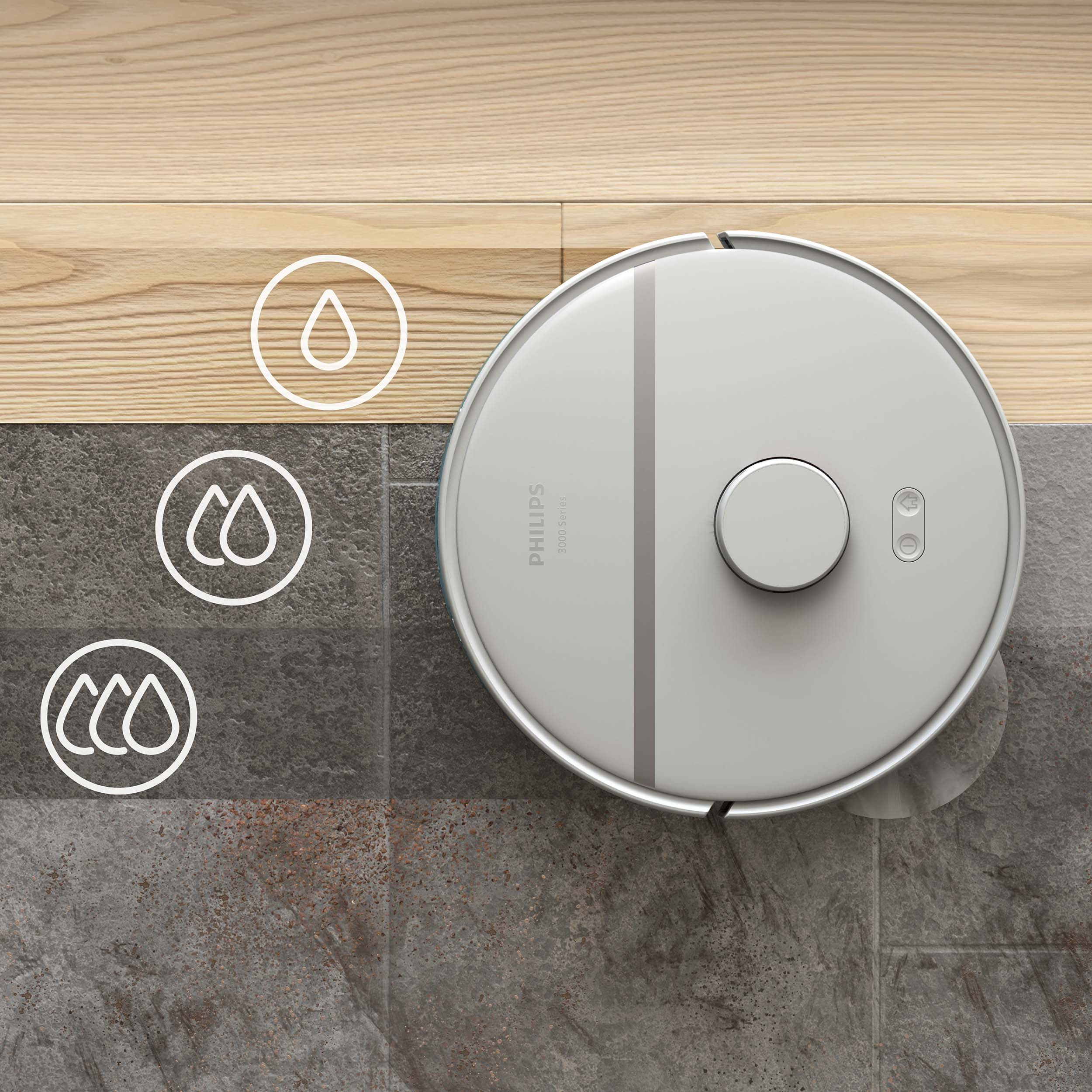 Odkurzacz robot na szarej podłodze z płytek.