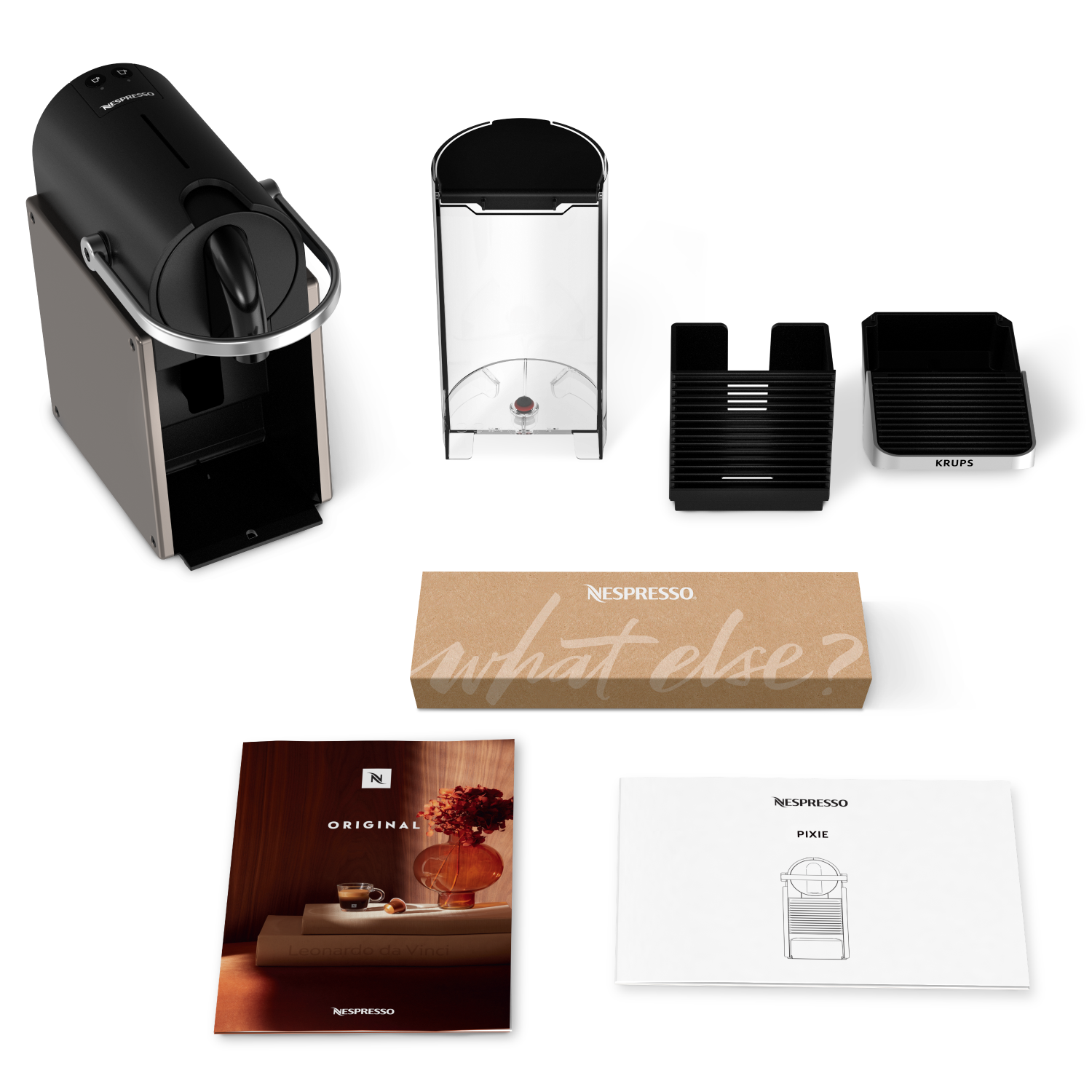 Nespresso coffee machine and accessories: water tank, capsule holder, and instructions.