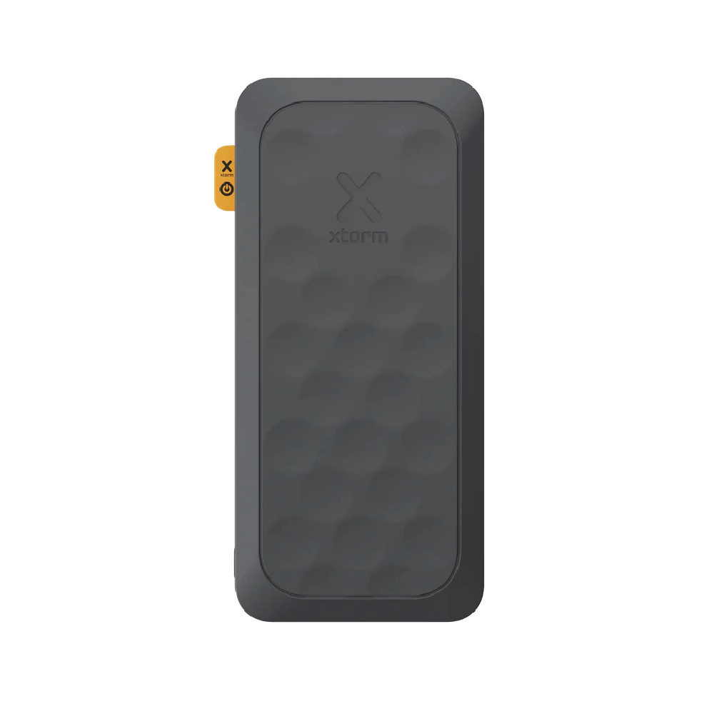 Dispositivo rectangular negro con superficie texturizada y logo 'X', con botón de encendido naranja.