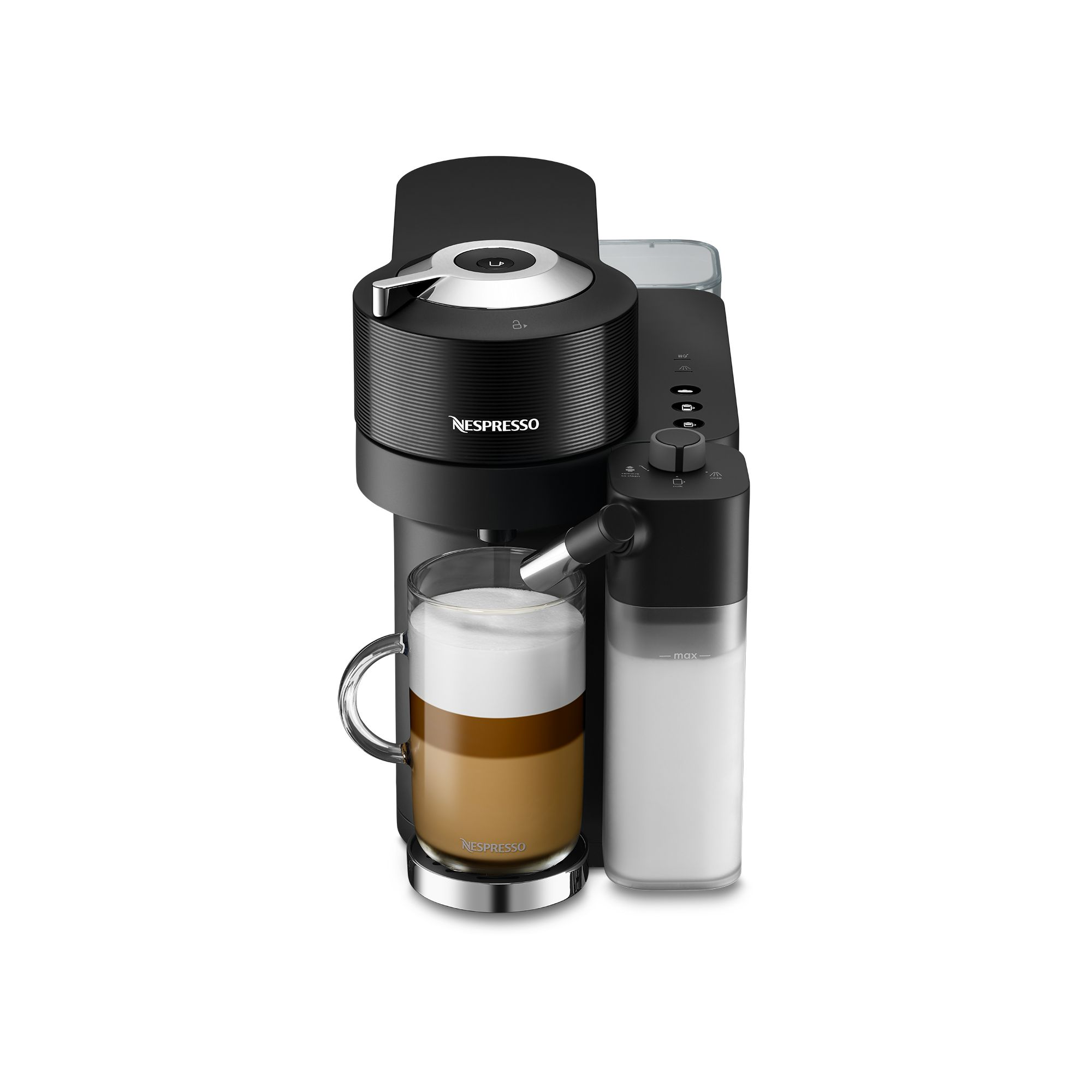 Siyah Nespresso makinesi, bir bardak latte ile. Süt köpürtücü sağda.