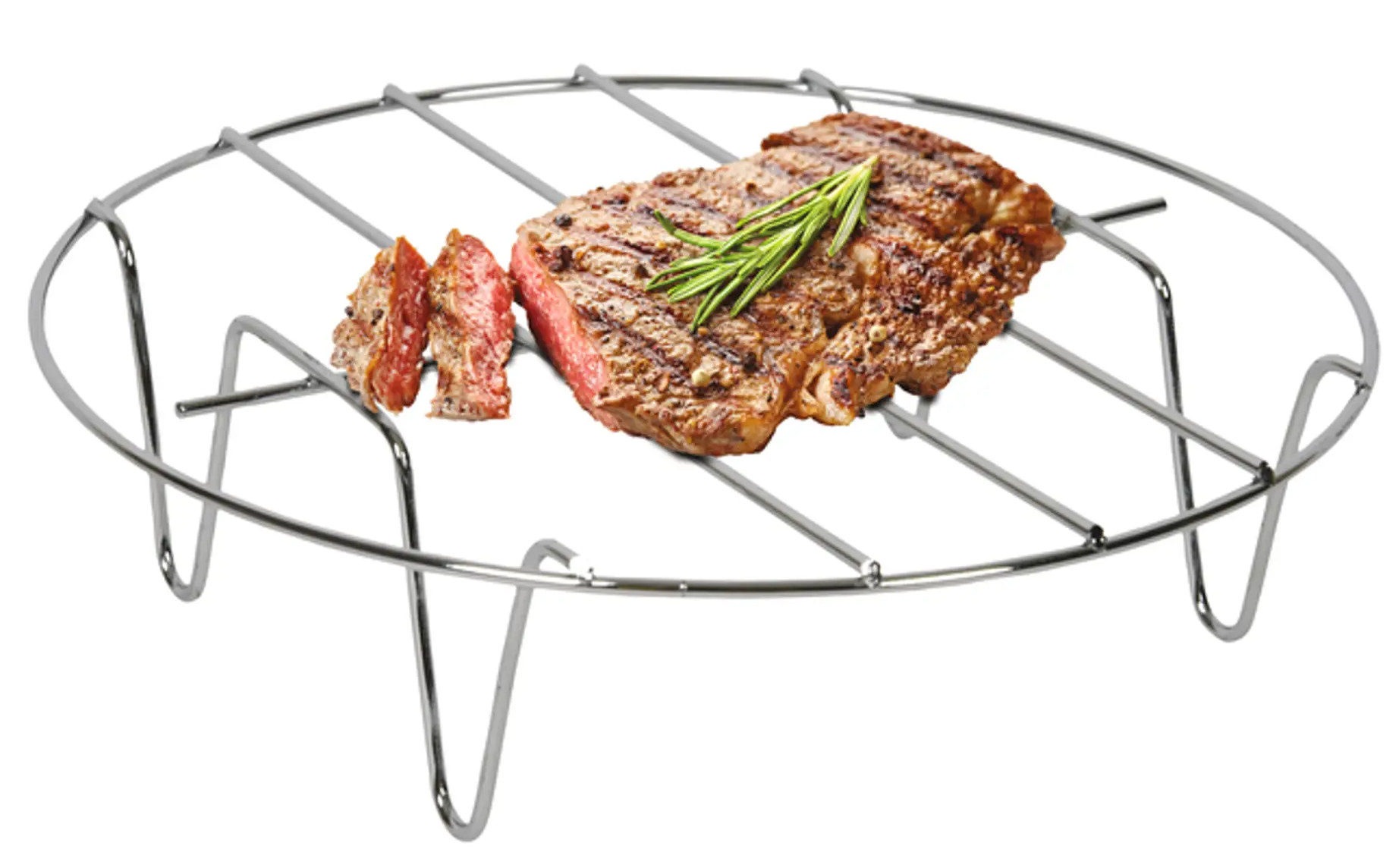 Stek na metalowym grillu. Kilka kawałków steku jest z boku.