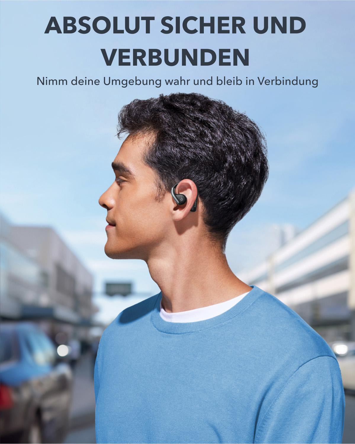 Mann mit Kopfhörern, der auf der Straße geht. Text: ABSOLUT SICHER UND VERBUNDEN.