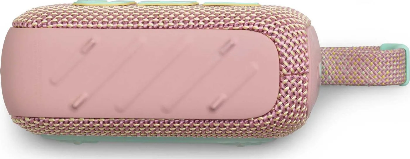 Różowy i żółty głośnik o fakturze tkaniny, z przyciskami sterującymi. Widoczna jest pętla.