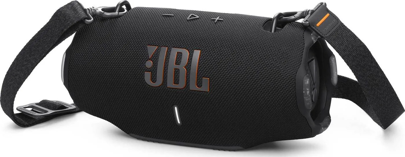 Czarny głośnik JBL z czarnym paskiem. Głośnik ma pomarańczowe logo JBL.