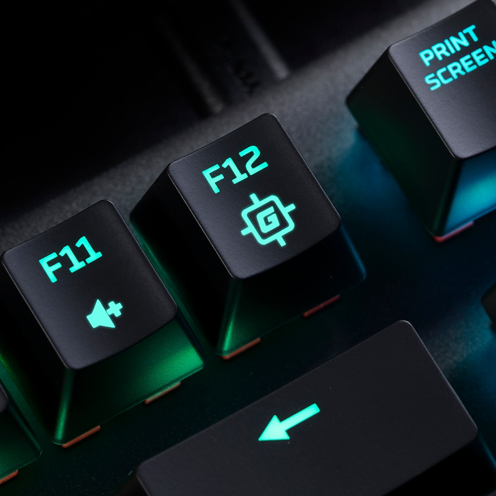 Nahaufnahme einer schwarzen Tastatur mit beleuchteten Tasten, darunter F11, F12 und eine Pfeiltaste.