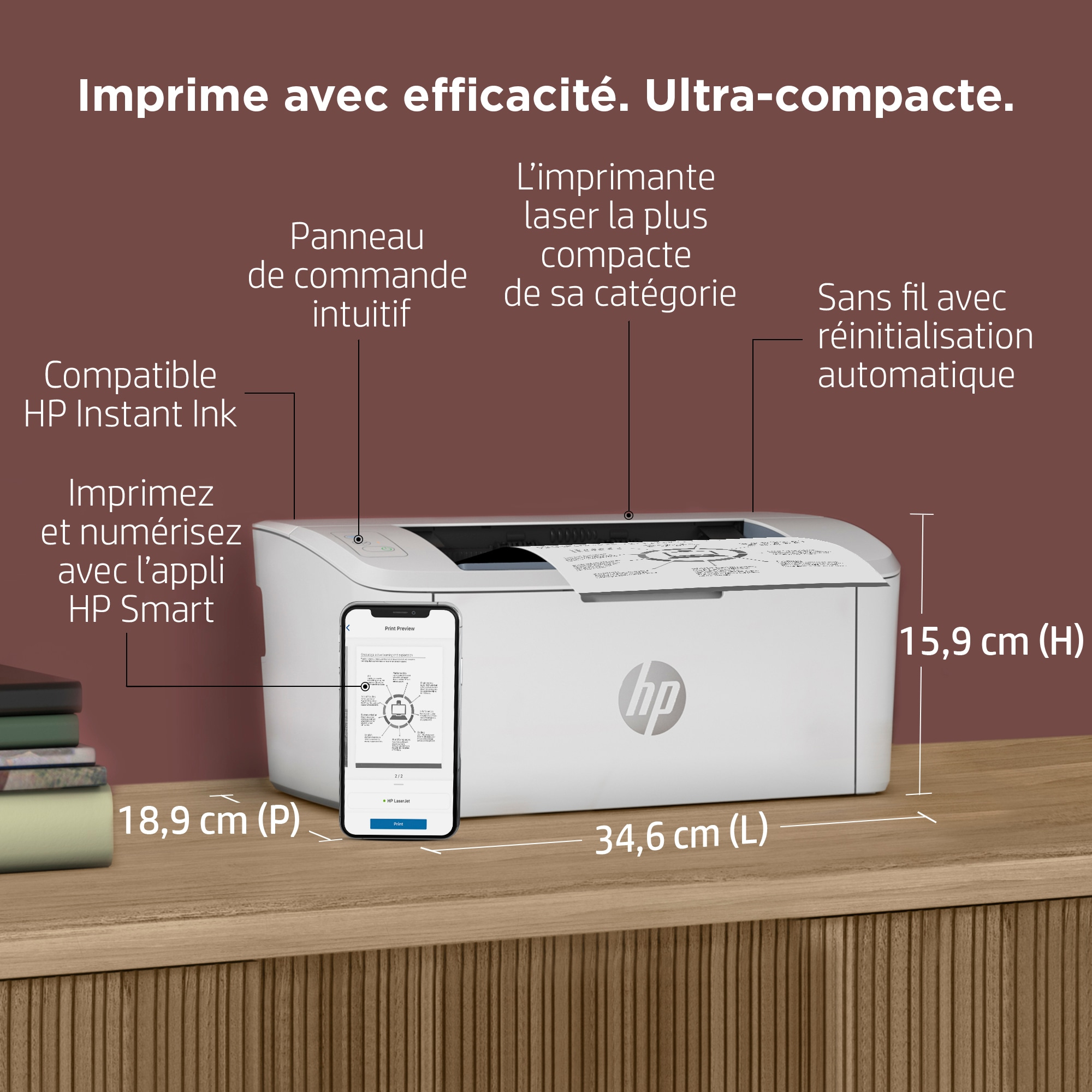 Weißer Drucker auf Holzoberfläche mit Telefon.