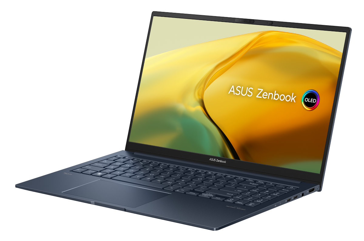 Laptop z ekranem wyświetlającym żółto-pomarańczowy gradient. ASUS Zenbook OLED.