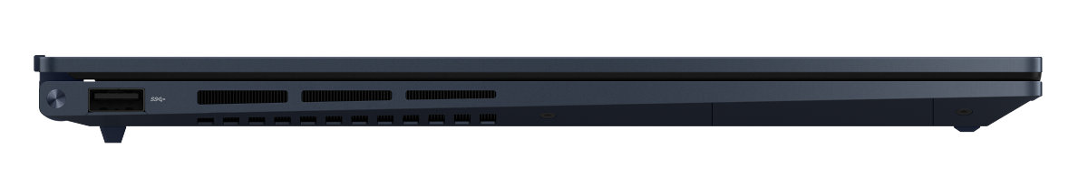 Widok z boku granatowego laptopa z kilkoma widocznymi portami i otworami wentylacyjnymi.