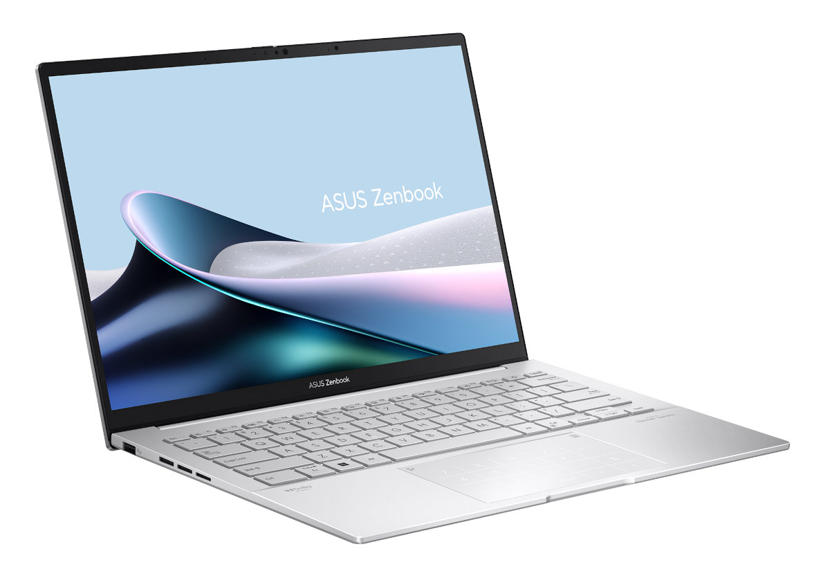 Srebrny laptop otwarty, ukazujący klawiaturę i ekran. Widoczne 'ASUS Zenbook'.