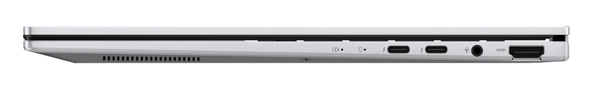 Widok z boku laptopa. Srebrny laptop z wieloma portami. Białe tło.