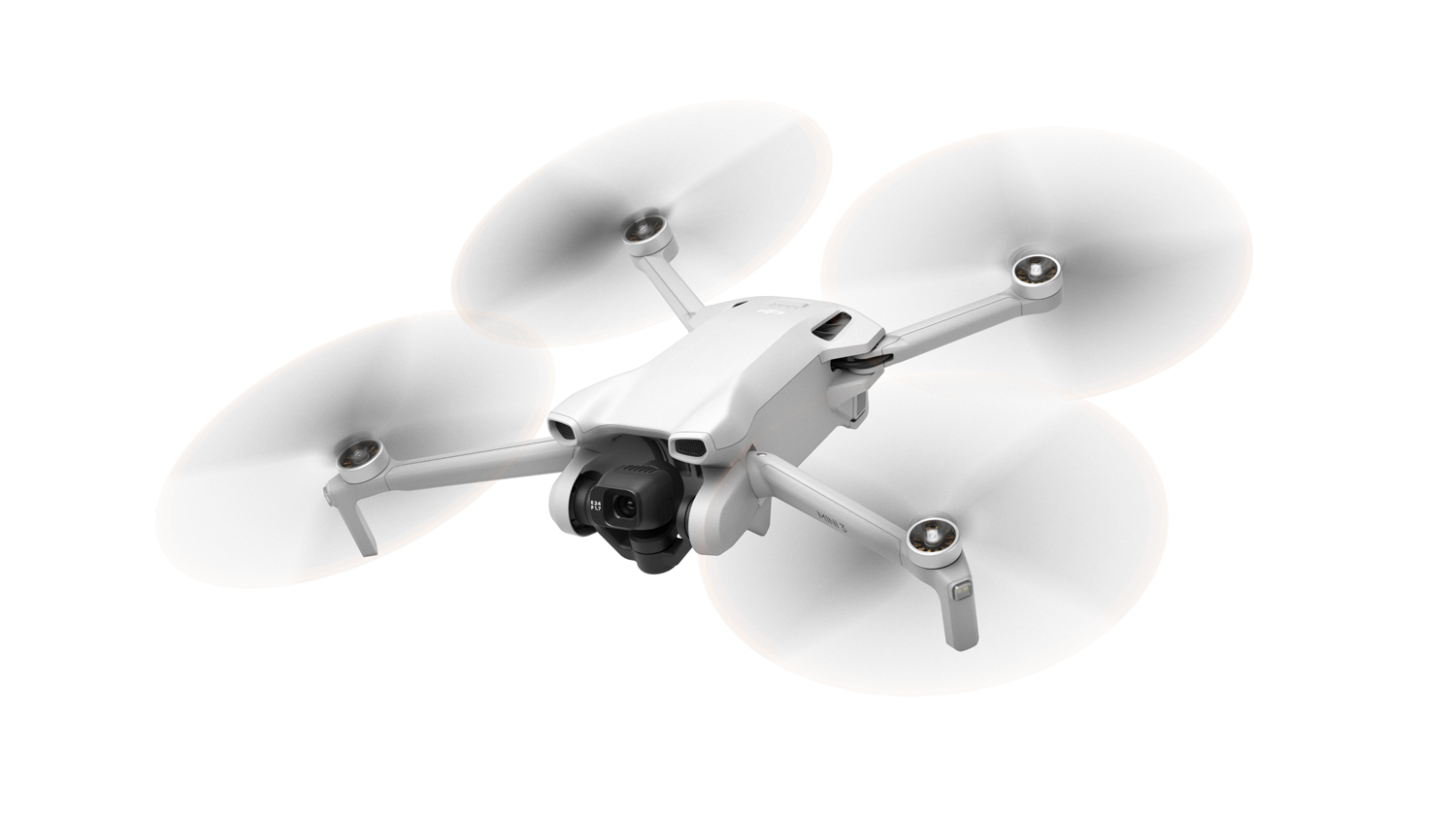 Beyaz bir arka plan üzerinde dört pervaneli beyaz bir drone.