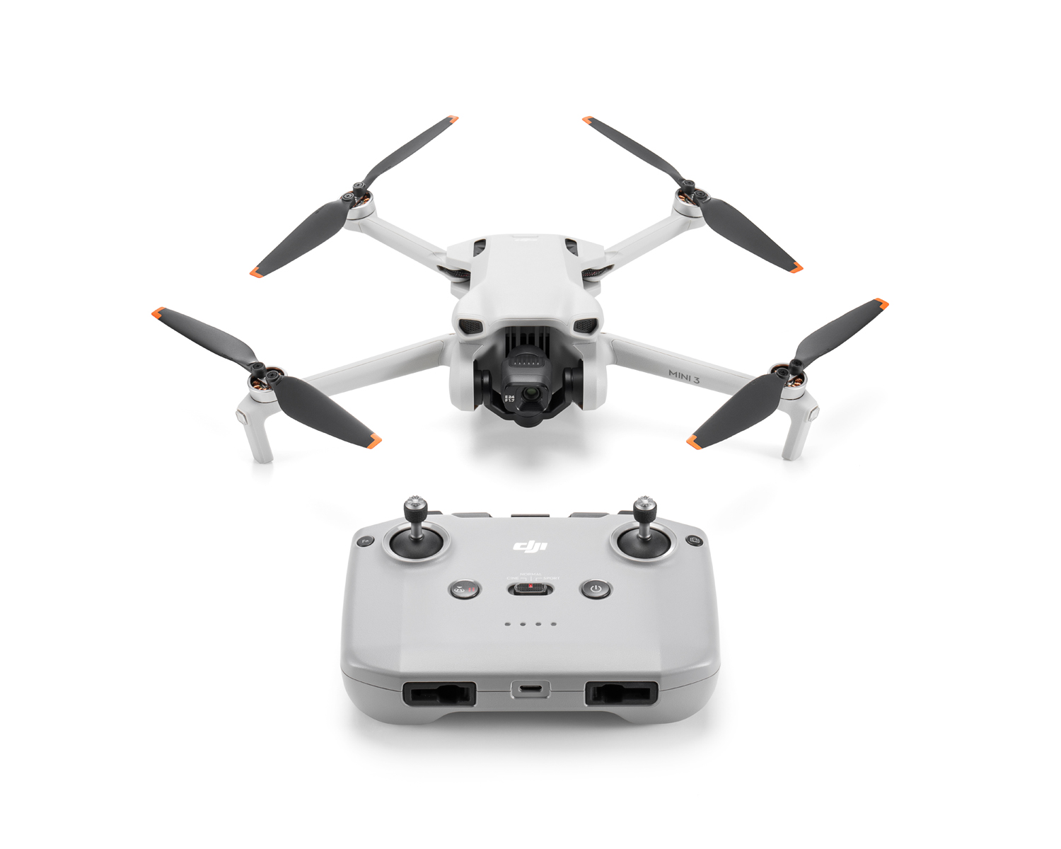 Beyaz bir drone ve uzaktan kumanda.